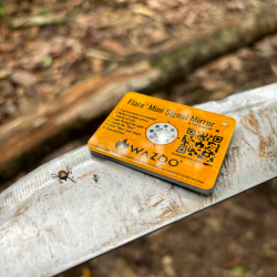 Wazoo Flare Mini Signal Mirror on log