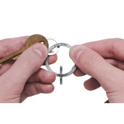 EXOTAC FreeKey Slim System Quick Release Keyring with a key with an accessory ring being attached